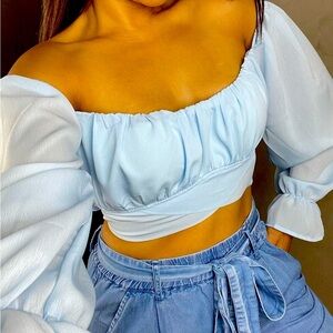 Cinderella Blue blouse. Never worn. New with tags